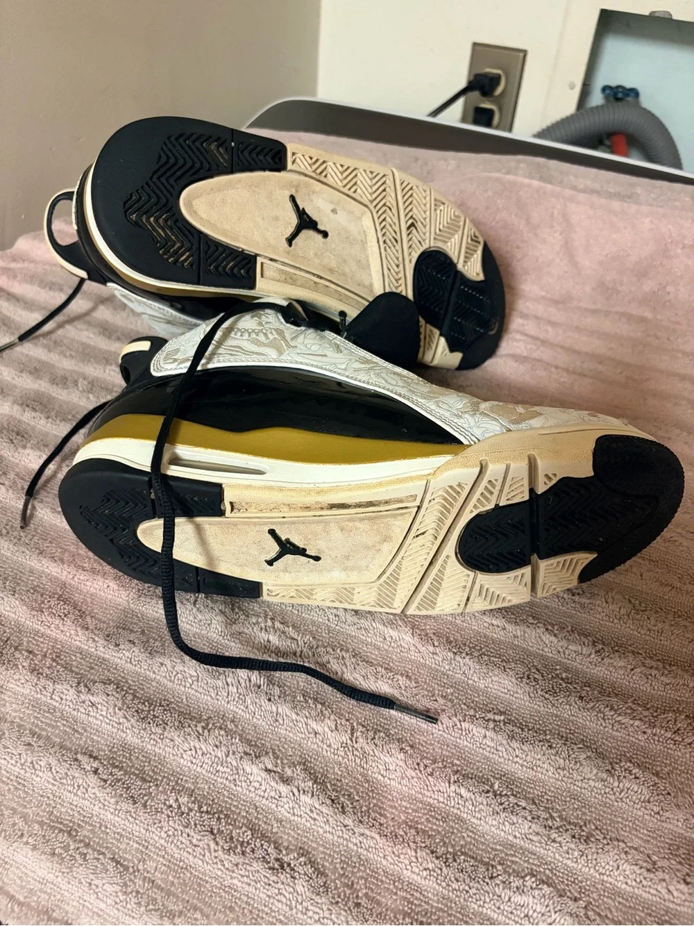 Jordan Mid-Top Sneakers in Black, White & Gold Detailing
